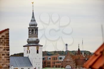 a view of a church tower in denmark
