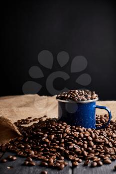 photography of coffee beans in a cup