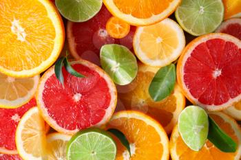 Slices of fresh citrus fruits as background�