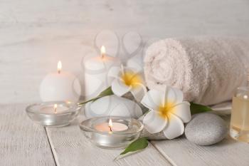 Set for spa treatment on wooden table�