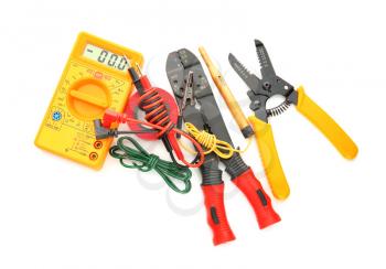 Different electrical tools on white background, top view�