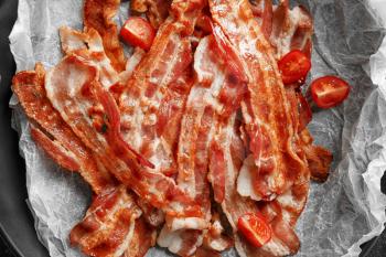 Dish with tasty fried bacon, closeup�