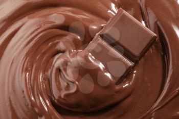 Tasty melted and solid chocolate, closeup�