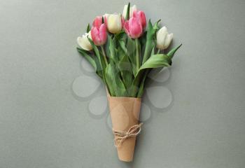 Bouquet of beautiful tulips on grey background�