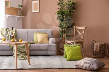 Stylish living room interior with comfortable sofa�