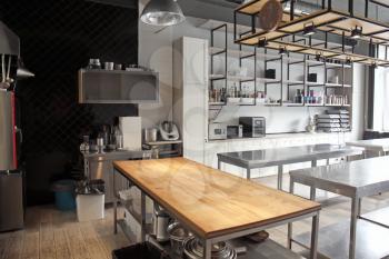 Interior of professional kitchen in restaurant�