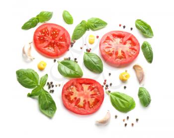 Composition with spices and tomatoes on white background�
