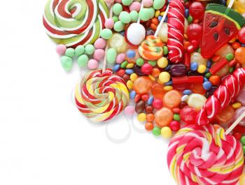 Colorful candies on white background�