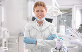 Young female dentist in clinic�