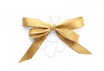 Beautiful bow from golden ribbon on white background�