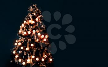 Beautiful decorated Christmas tree on dark color background�