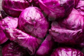 Ripe red cabbages as background�