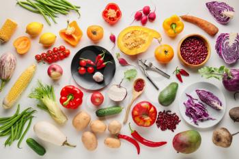 Different vegetables on white background, flat lay�