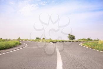 Empty asphalt crossroad in countryside�