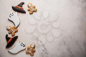 Creative cookies prepared for Halloween party on light background�