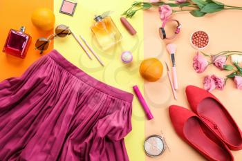 Composition with female items on color background�