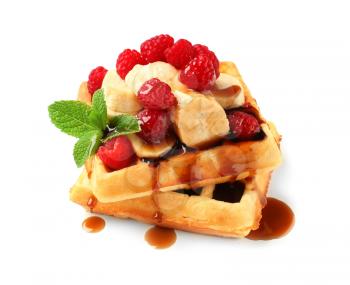 Tasty waffles with fruit, berries and chocolate topping on white background�
