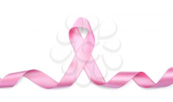Curled pink ribbon on white background. Breast cancer concept�