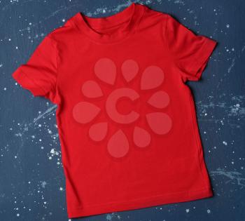 Child t-shirt on color background�