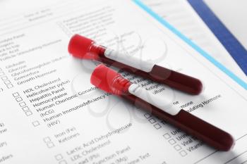 Blood samples on document with result of analyses�