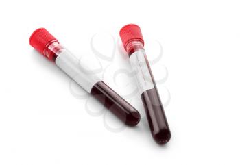 Test tubes with blood samples on white background�