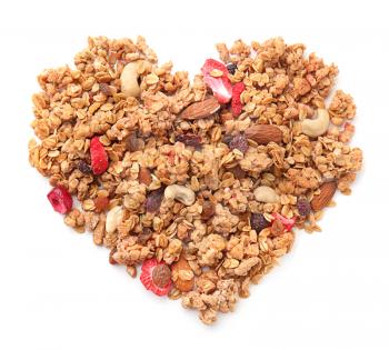 Heart made with granola on white background�