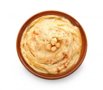 Bowl with tasty hummus on white background�