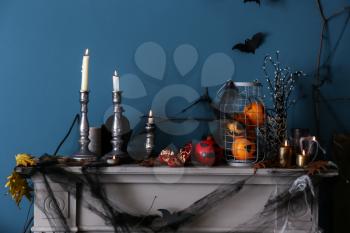 Decorations for Halloween party on mantelpiece�