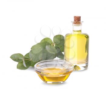 Bottle and bowl with eucalyptus essential oil on white background�