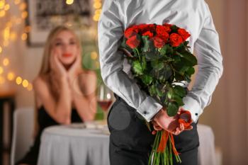 Young man going to make proposal in restaurant�