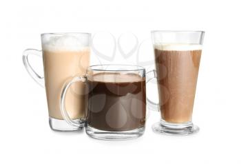 Glass cups with tasty aromatic coffee on white background�