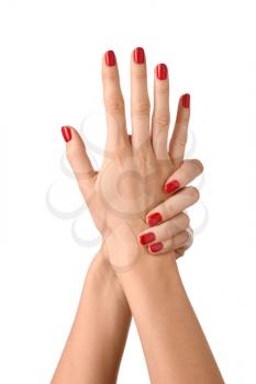 Female hands with manicure on white background�