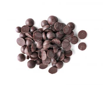 Delicious dark chocolate chips on white background�