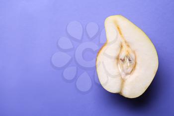 Half of fresh juicy pear on color background. Erotic concept�
