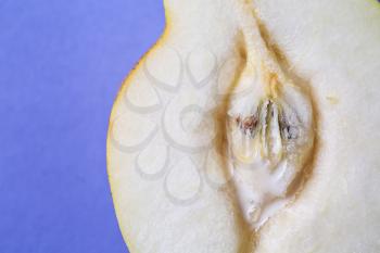 Half of fresh juicy pear on color background, closeup. Erotic concept�