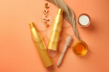 Flat lay composition with natural cosmetics for hair on color background�