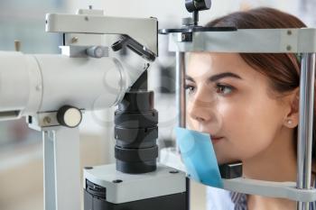 Young woman visiting ophthalmologist in clinic�