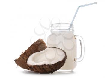 Mason jar of coconut water on white background�