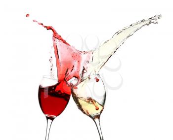 Glasses with splashing wine on white background�