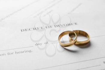 Rings with decree of divorce, closeup�