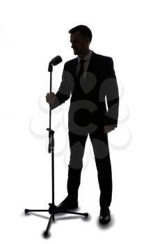 Silhouette of young singer on white background�