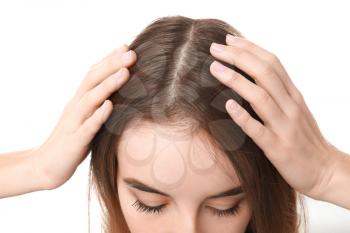 Woman with hair loss problem on white background�