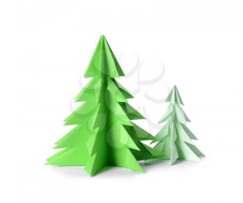 Green origami fir trees on white background�