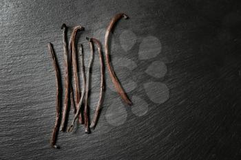 Aromatic vanilla sticks on dark background�