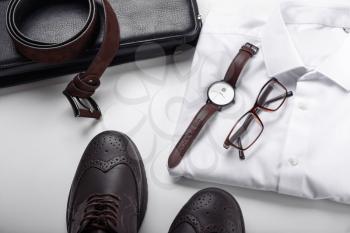 Stylish men's clothes with accessories on white background�