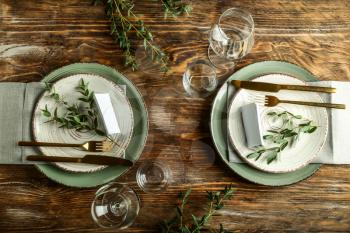 Simple table setting on wooden background�