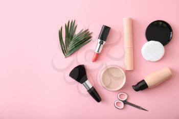 Set of cosmetics with accessories on color background�