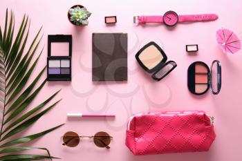 Flat lay composition with cosmetics, accessories and passport on color background�