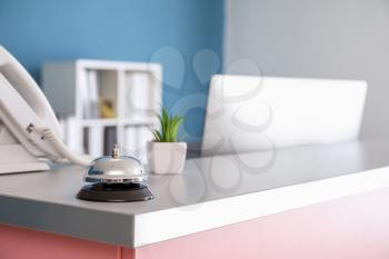 Service bell on reception desk in clinic�