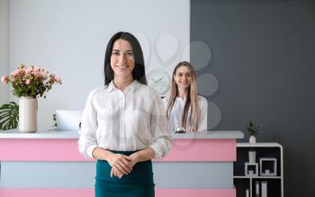 Young female receptionist in hotel�